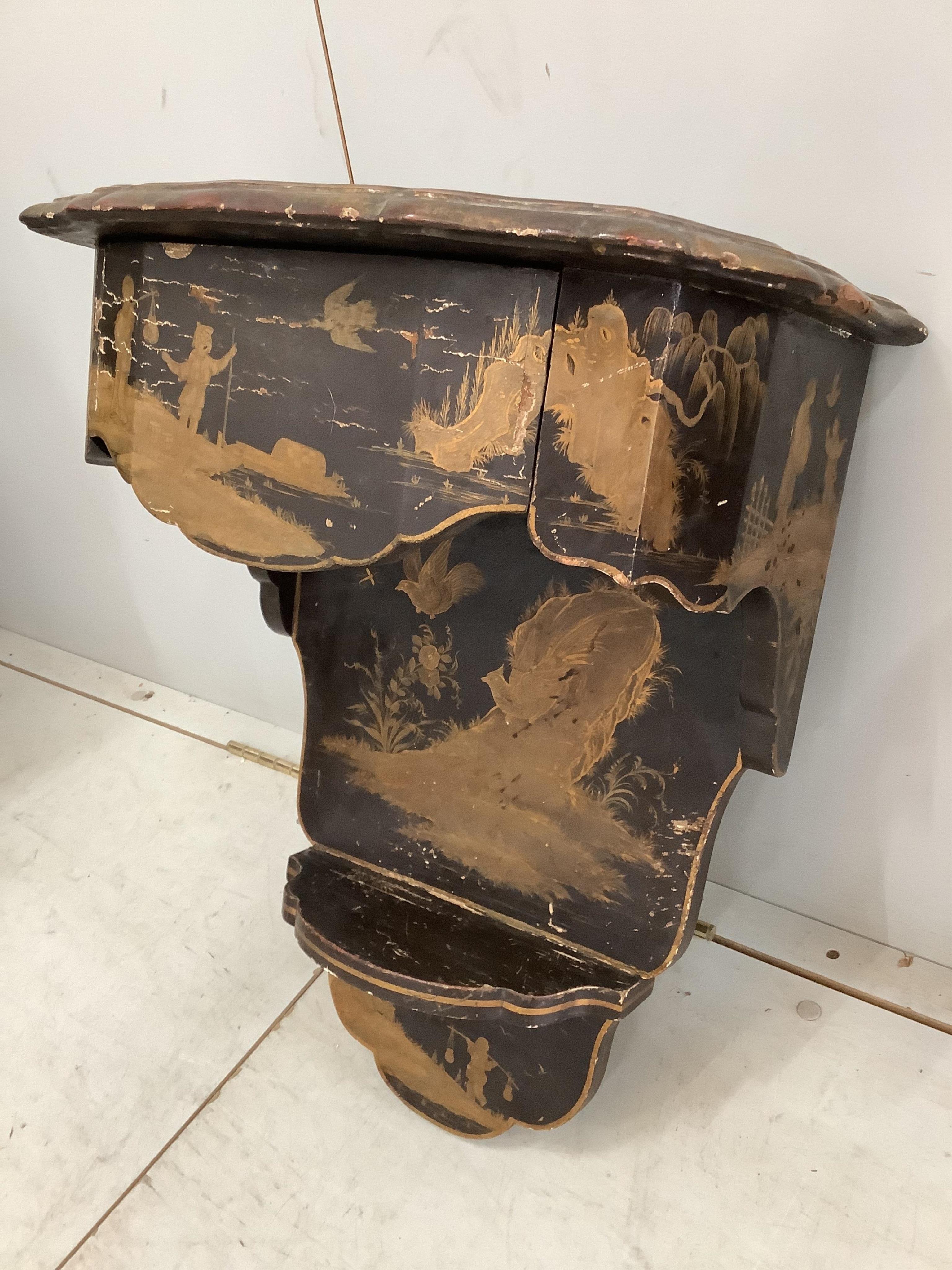 A pair of chinoiserie lacquer wall brackets each fitted single drawer, width 44cm, depth 29cm, height 56cm